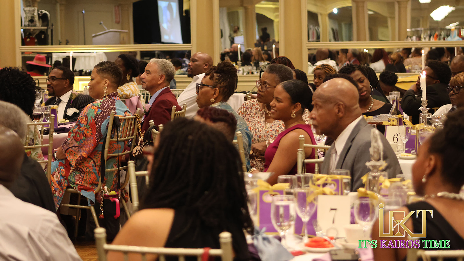 Attentive guests at formal banquet tables